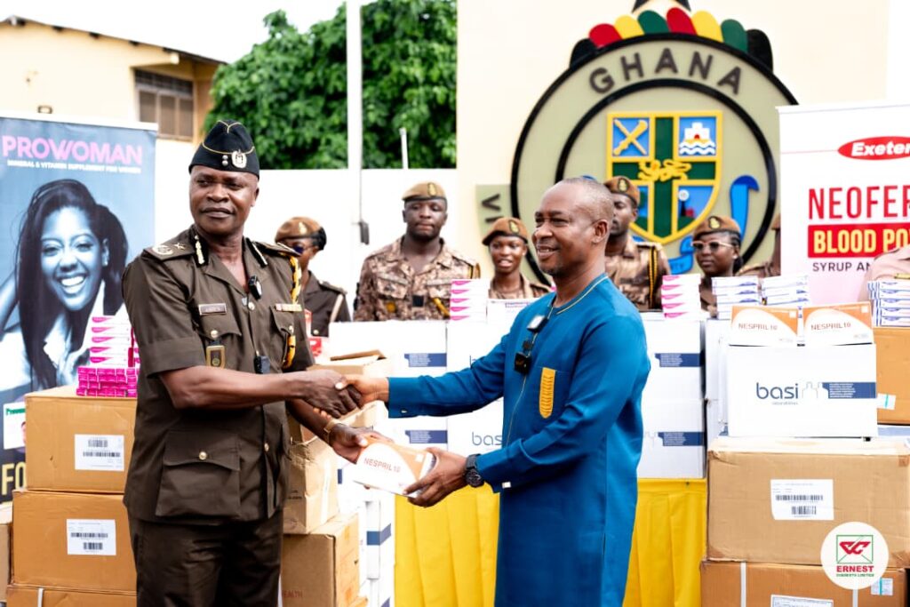 The Deputy Director of Prisons, DSP Edmond Ashun (Left) , The Head of Commerce- Ernest Chemists, Mr. Emmanuel Adu (Right)